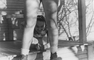 Jean hiding behind Guy